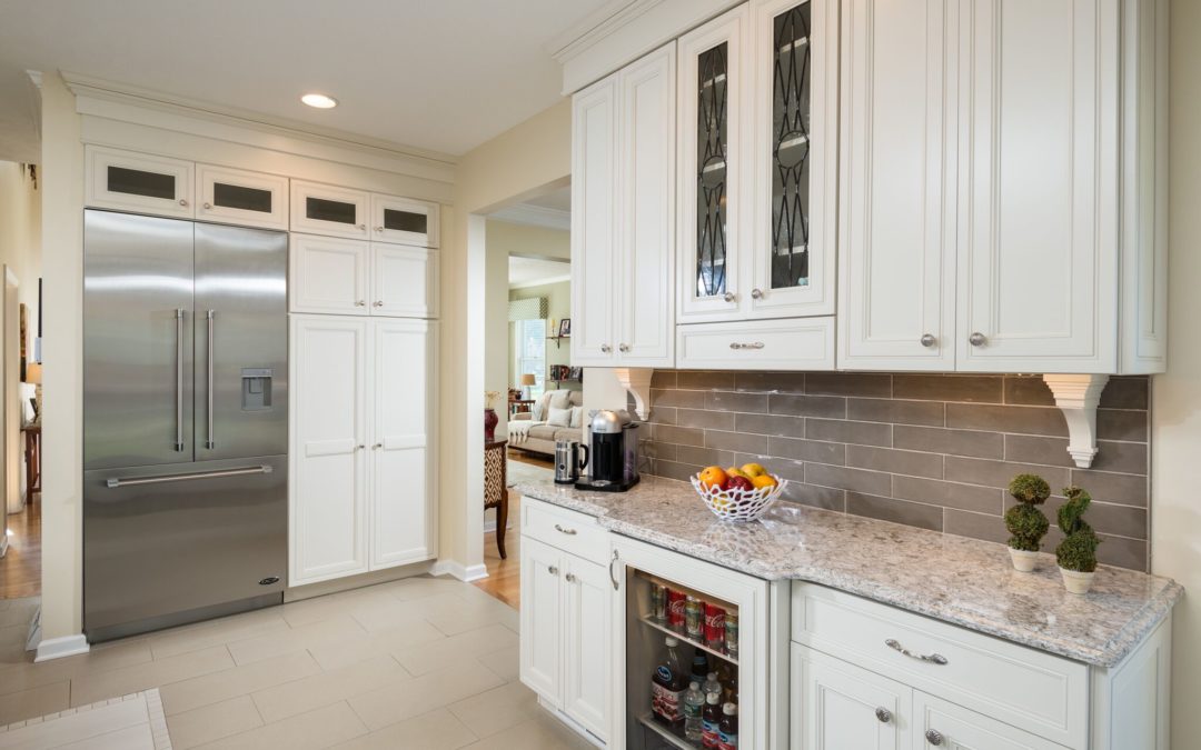 creamy pantry cabinet with fridge