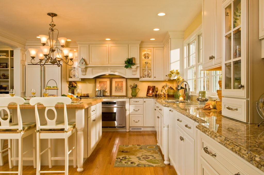 bright kitchen view of stove and sink